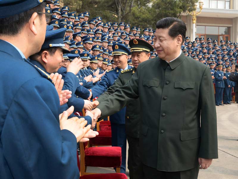 2014年4月14日，習(xí)近平到空軍機關(guān)就空軍建設(shè)和軍事斗爭準(zhǔn)備進(jìn)行調(diào)研。李剛 攝 